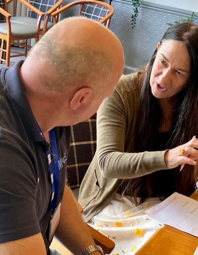 A productive one-on-one discussion over coffee at a BNI meetup.